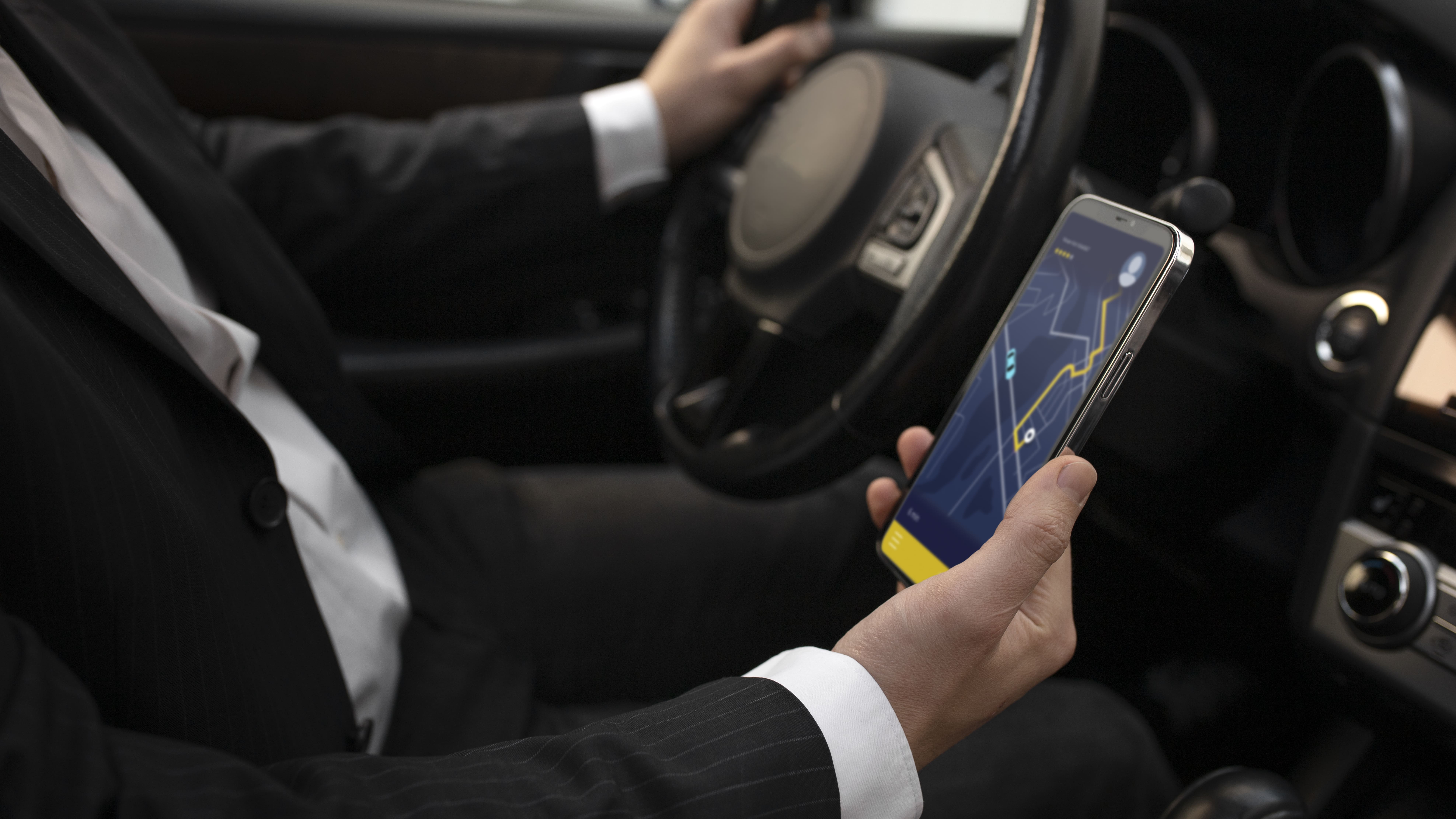 man-giving-taxi-services-through-app (1).jpg